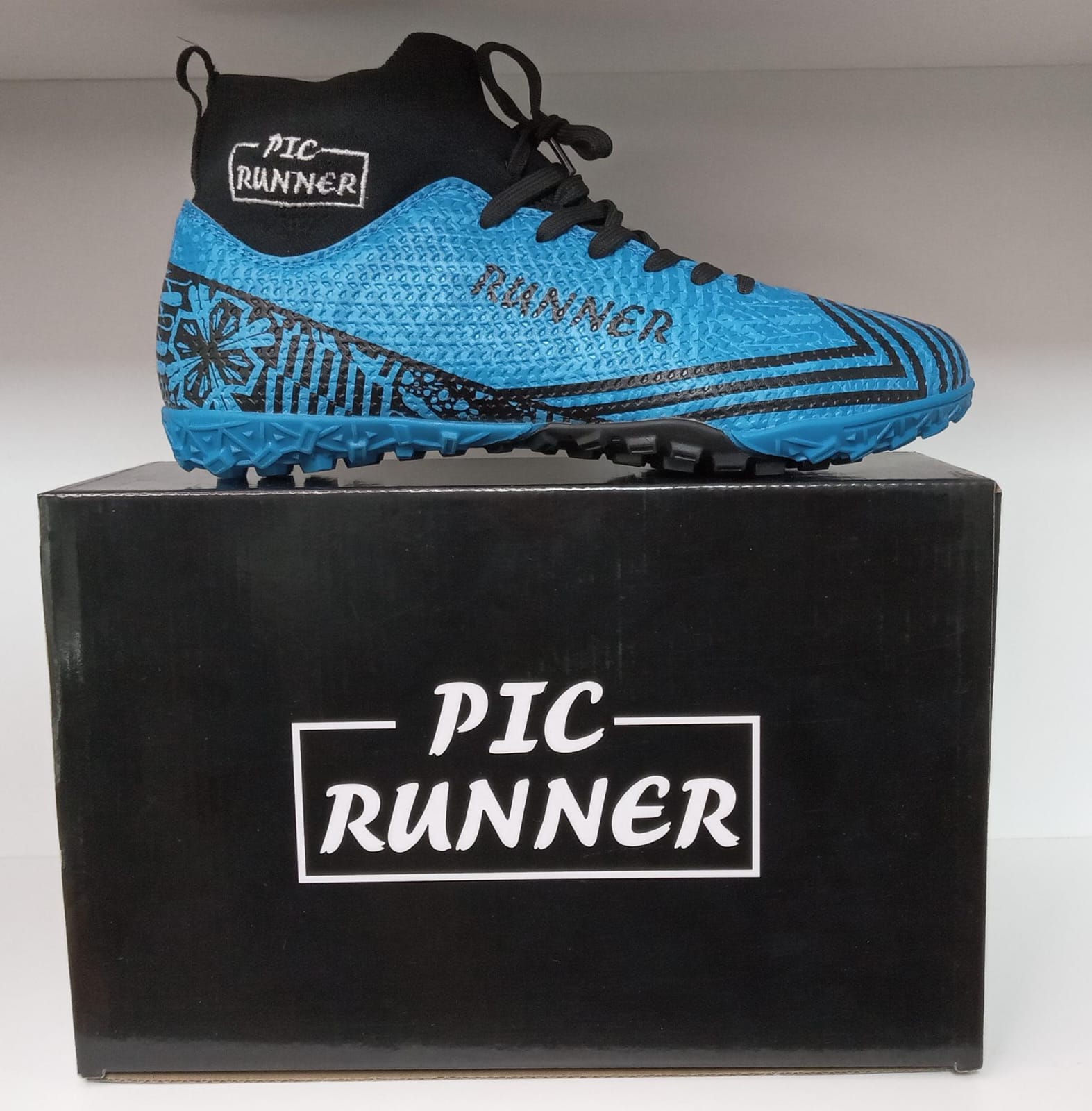 Storm blue caña alta con media autoajustable